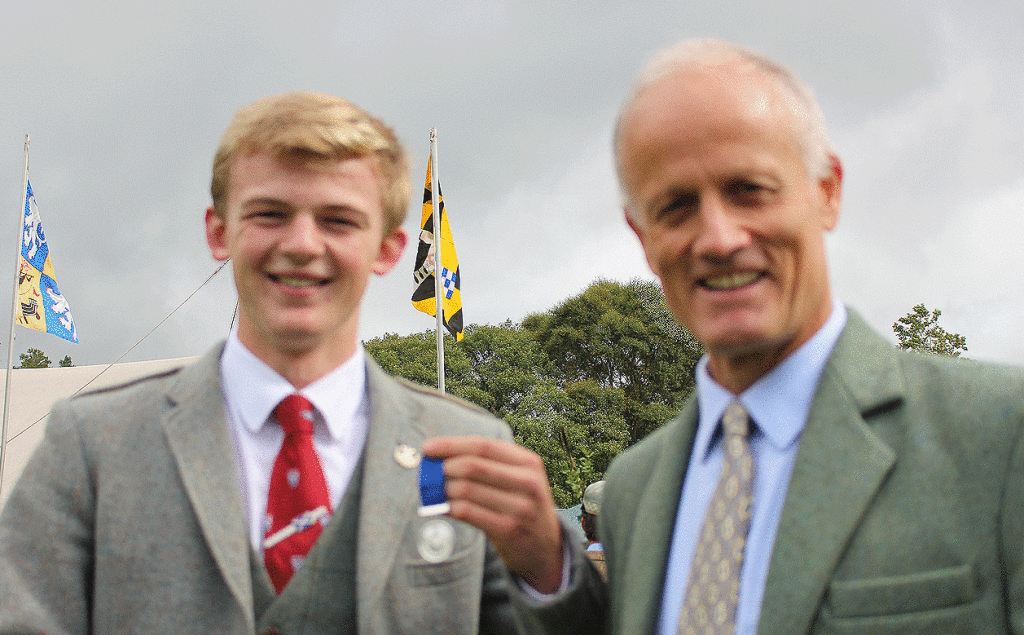 Sandy Cameron receives his medal from John Campbell of Kilberry, sponsor of the event