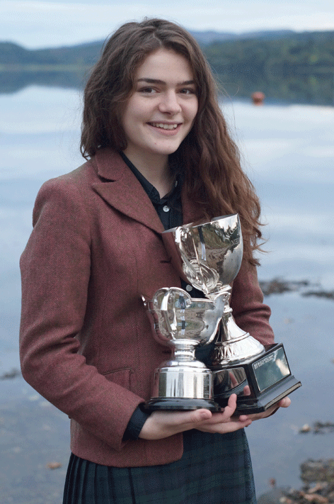 Brighde Chaimbeul pictured on the shores of Loch Etive with her trophies