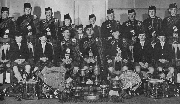 Monktonhall Colliery Pipe Band in 1972. As ever we would appreciate some names. We can identify P/M Willie McBride front left, RSPBA Adjudicator Jennifer Hutcheon standing at the rear and, Donald McBride sitting front right