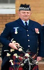 Brian Niven with medals