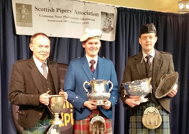 First prizewinners (l-r) Allan Russell, Graham Drummond and Ross Cowan with the historic SPA trophies
