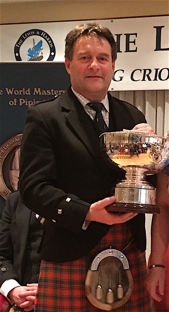 Angus MacColl with the H&J trophy