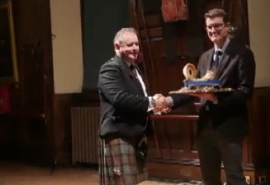 Rodedrick MacLeod winner of the 2016 Glenfiddich Championship receives his trophy from Mr Addington